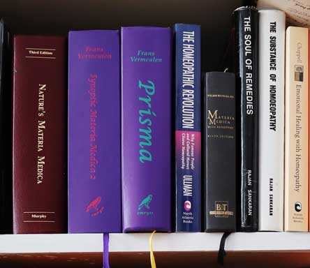 Photo of homeopathy books on Eric's selves