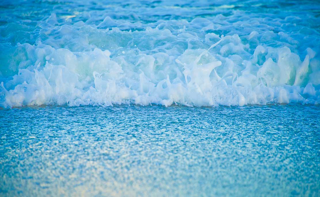 Photo by of light blue waves Lanvi Nguyen.